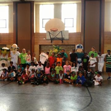 ACE mascots with kids at Dayton 